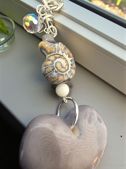 Super Thick Gray Tagua Carved Heart Bag Charm or Keychain with Ceramic Snail Shell Bead Plus a little Bling