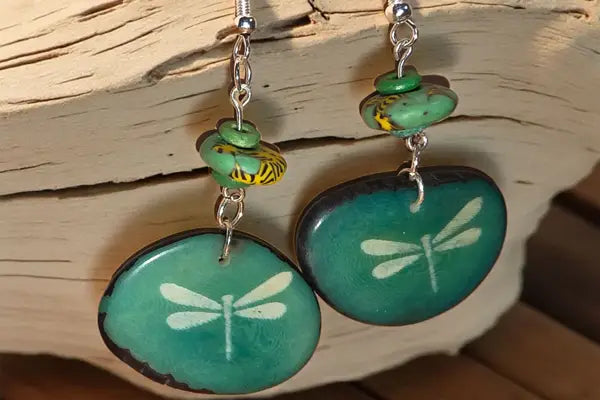 Teal dragonfly-themed pendant earrings with silver-toned hooks and beads from see whats new here collection