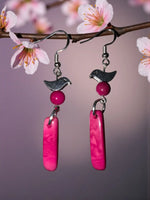 Pink bird-shaped tagua earrings with silver coated brass hooks and vibrant fuchsia rectangular pendants handcrafted