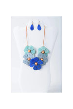Becca handmade flower bib necklace set with blue and teal resin petals and copper toned centers with matching earrings