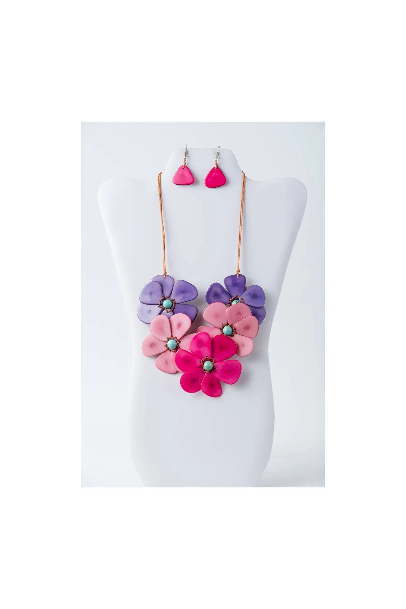 Becca handmade flower bib tagua necklace set with vibrant pink purple petals and teal centered teardrop earrings