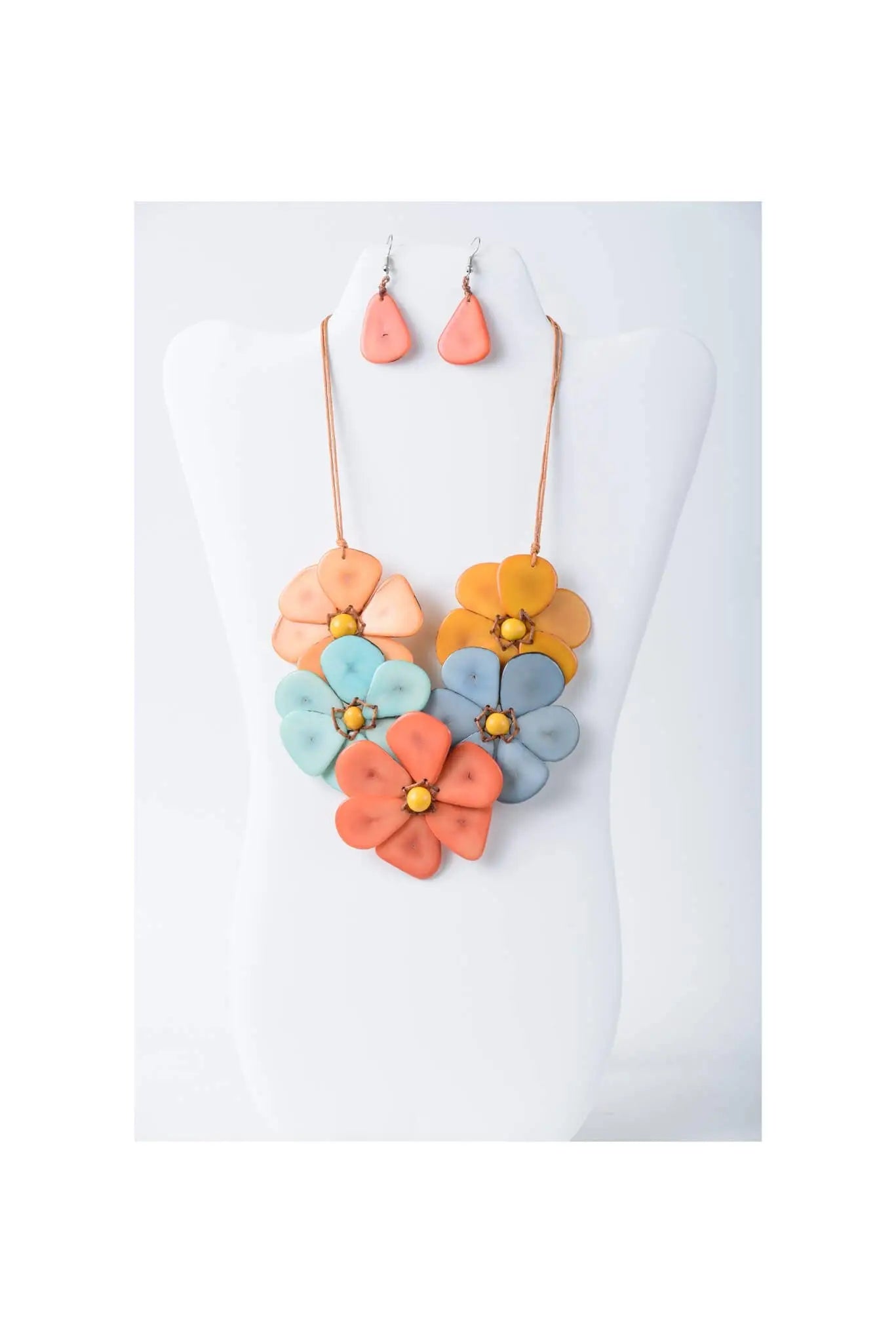 Vibrant becca handmade flower bib tagua necklace with peach orange blue petals and yellow centers in a floral design