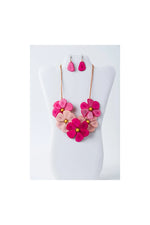 Vibrant pink and peach flower bib necklace with gold centers handmade by becca displayed on a mannequin