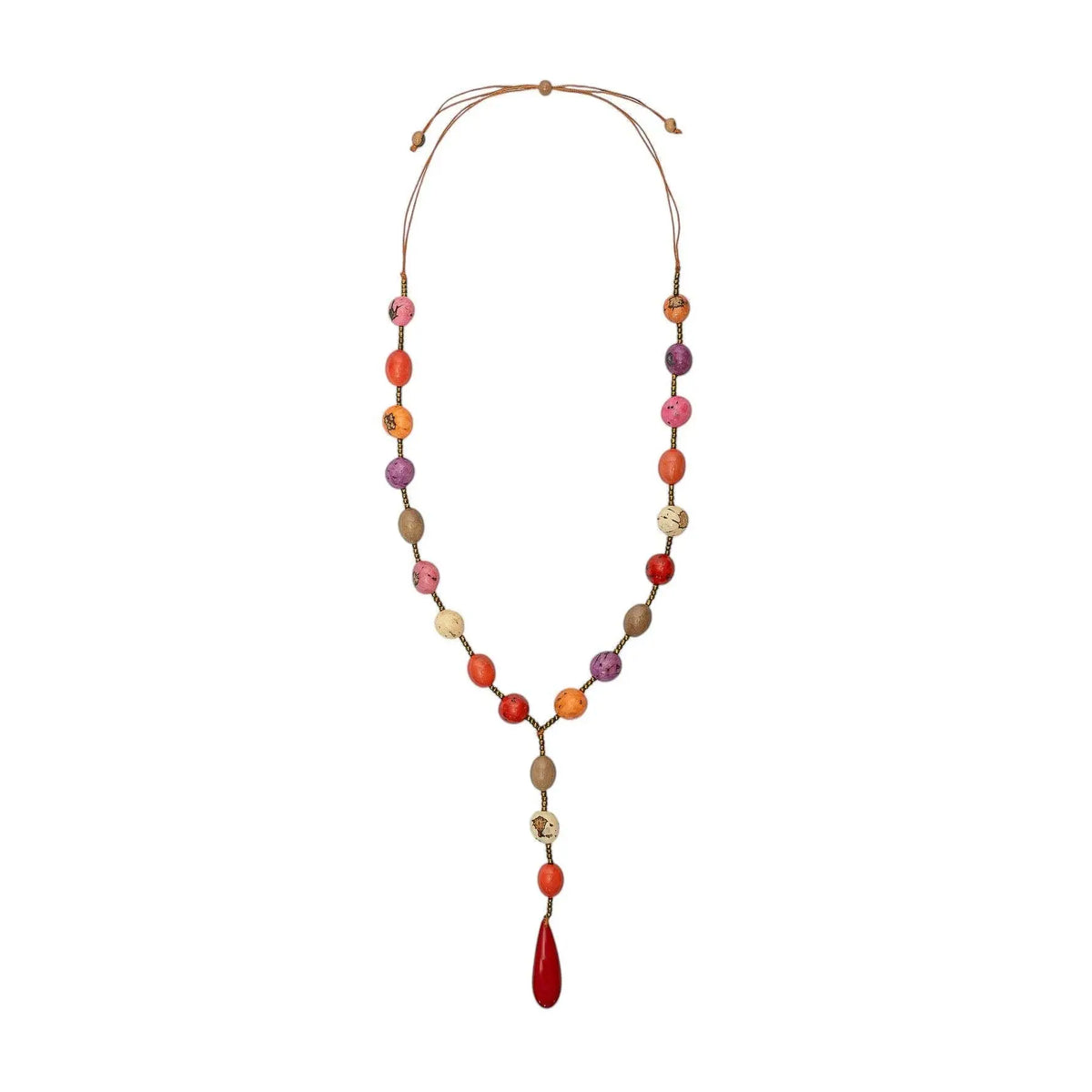 A becky necklace featuring vibrant bombona seeds and tagua nut beads with earthy tones and a red teardrop pendant