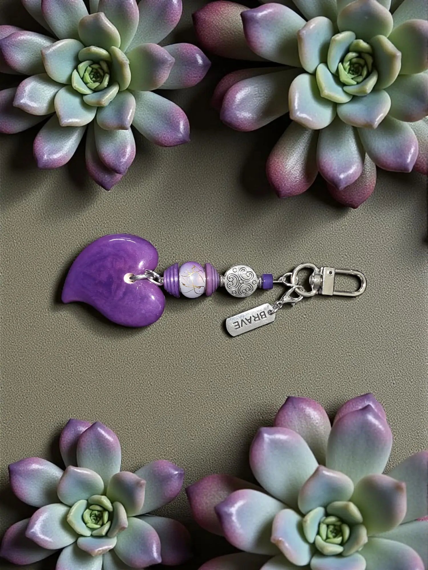 Brave purple tagua carved heart keychain with silver-toned clasp and tibetan amulet metal bead charm