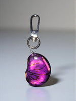 Burgundy key chain bag charm with purple and pink marbled resin and silver toned metal clasp