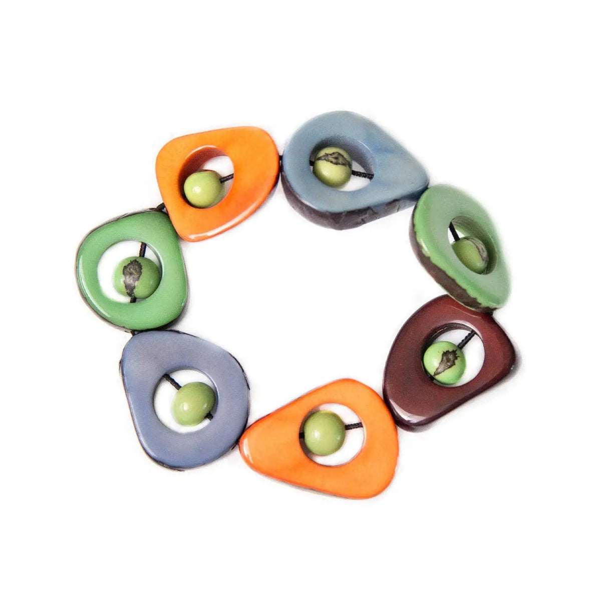 Colorful aztec bracelet with carved tagua pieces and acai berry green seed beads in orange green blue and brown tones