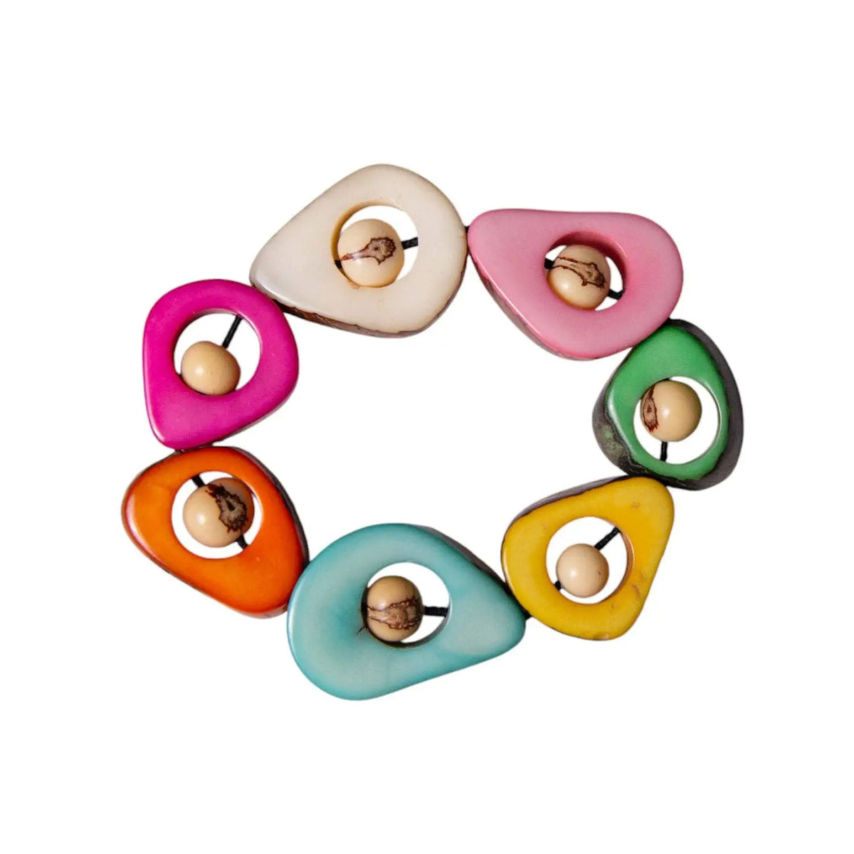 A vibrant aztec bracelet with carved tagua pieces and acai berry toned seed beads in bright multicolors