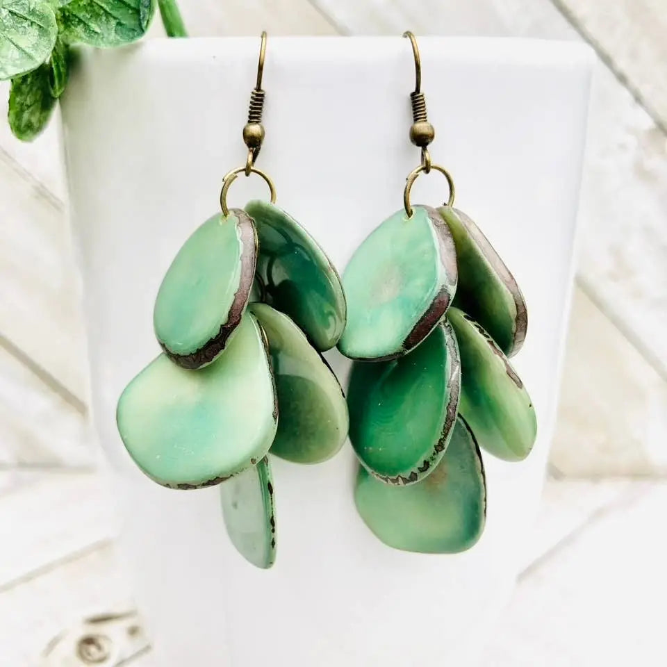 Green layered ceramic pendant cascada earrings with rustic finish and bronze hooks seafoam color