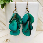 Teal heart-shaped shell cascada earrings with bronze hooks and layered design perfect for everyday wear