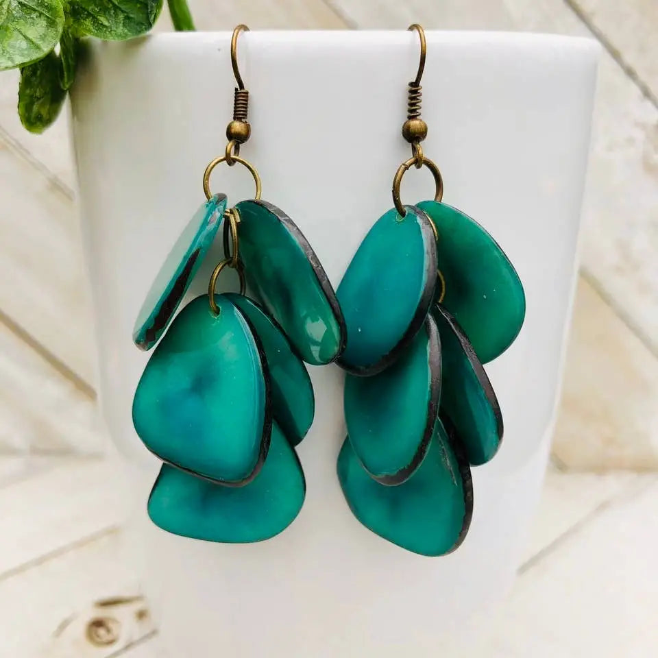 Teal heart-shaped shell cascada earrings with bronze hooks and layered design perfect for everyday wear