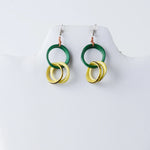 Catalina circular tagua earrings in green and yellow with layered stacked circular tagua hoop design