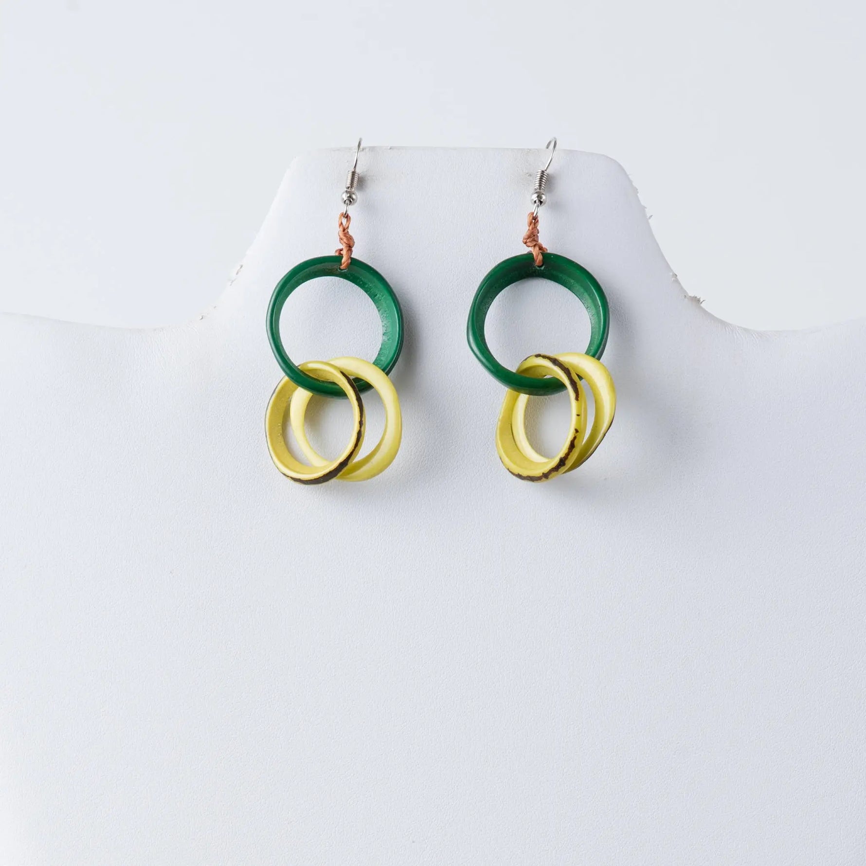 Catalina circular tagua earrings in green and yellow with layered stacked circular tagua hoop design