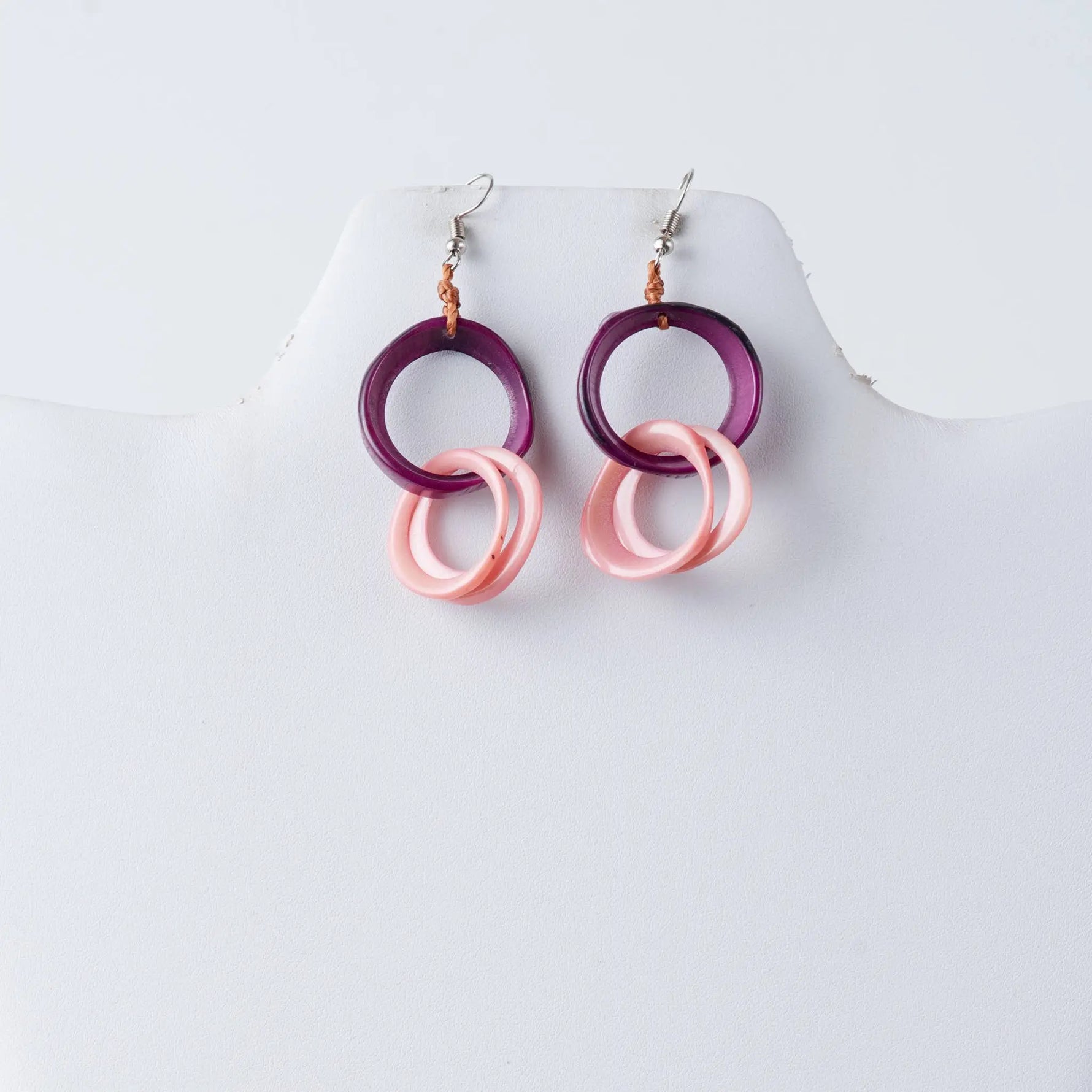 Purple and pink circular tagua earrings with layered interlocking resin design perfect for stylish everyday wear