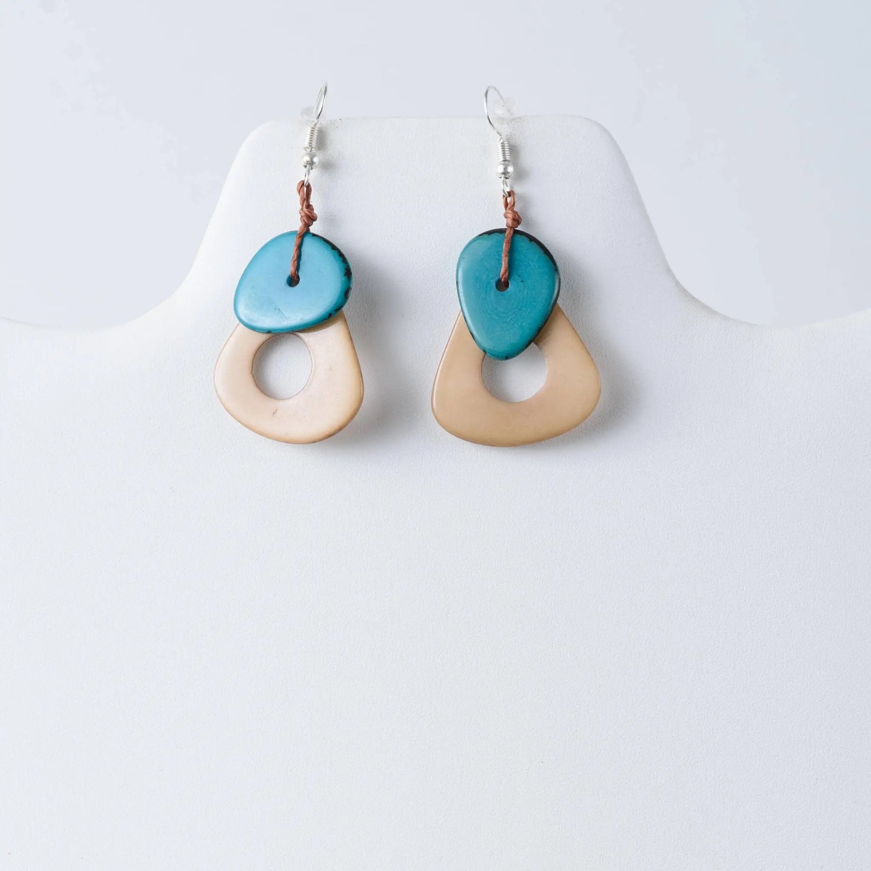 Teal and beige ceramic drop earrings with a simple modern design from the charli geometric tagua collection