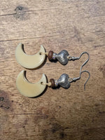 Cream moon hand-carved tagua nut earrings with filigree silver heart charm and brown bead lightweight nut earrings made in usa