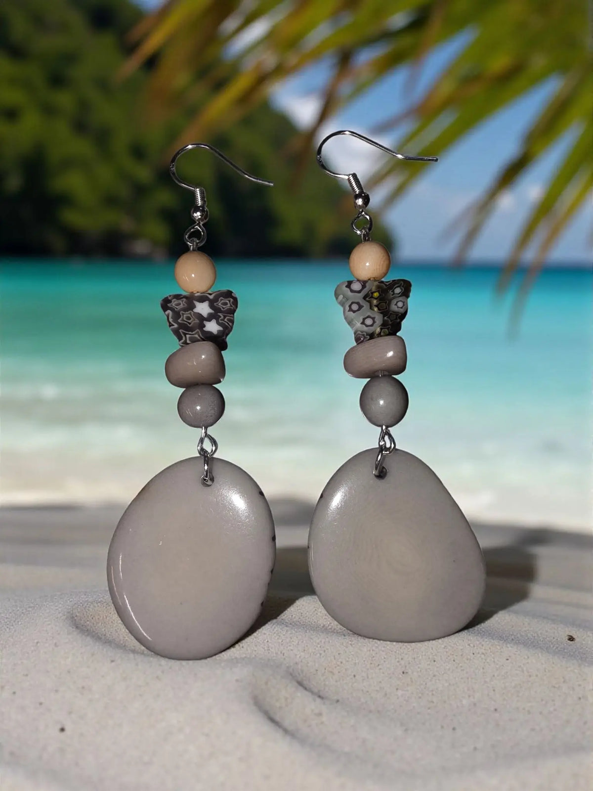 Dove gray polished tagua slice earrings with smooth gray stone beads and mixed glass bead accents