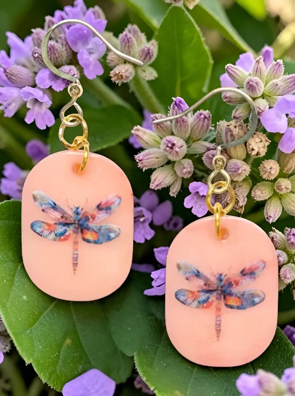 Peach-colored eleni earrings with painted dragonfly tagua nut design and gold-toned hooks for a cute look