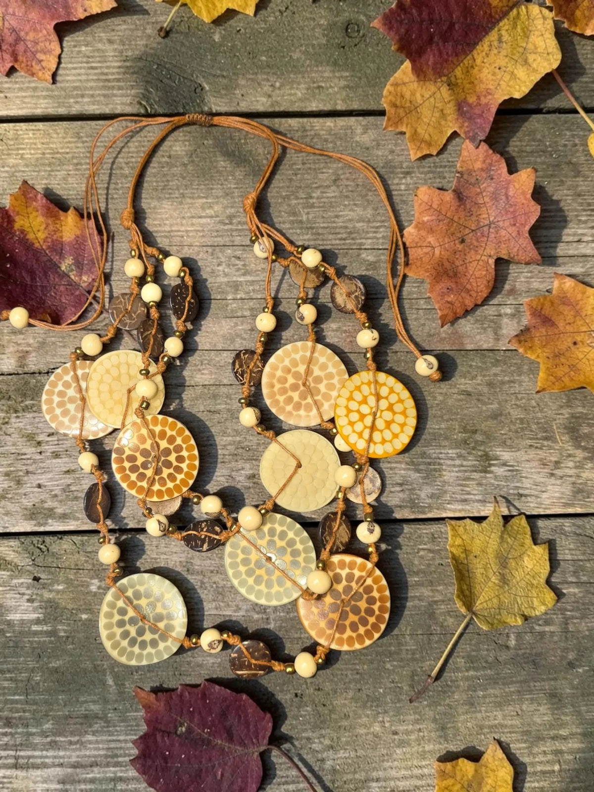 Lana eco-chic layered necklace with engraved tagua honeycomb discs coconut beads and cream accents on tan leather cord