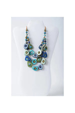 Eden three stranded tagua necklace set with layered ceramic beads in blue teal green and gold accents tagua necklace set