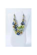 Eden three stranded tagua necklace with vibrant blue green and yellow teardrop beads and smaller round accents