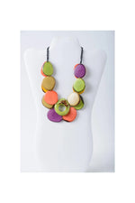 Vibrant multicolored layered tagua slice necklace with green purple orange and beige tones from ella collection