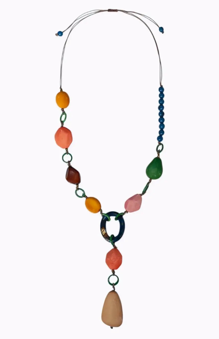 Flattering jacinta necklace with asymmetrical design featuring a central drop tagua and vibrant multi-colored beads