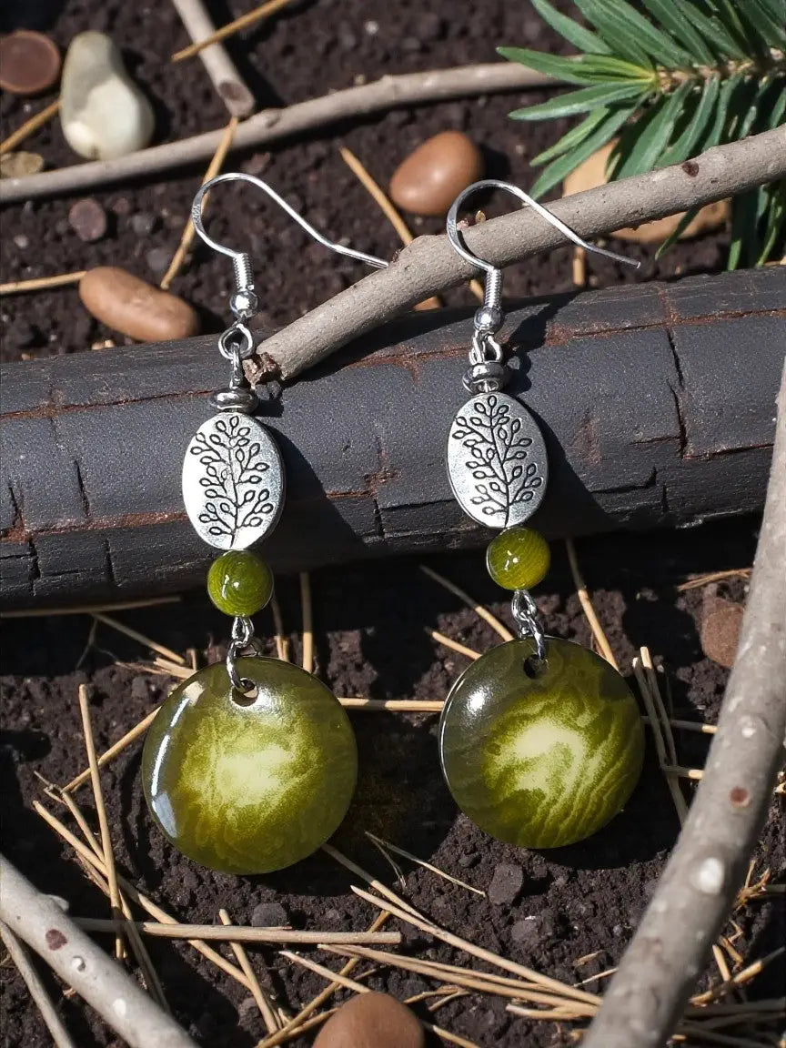 Forest green misty collection oval earrings with silver leaf engravings and translucent green beads eco friendly vegetable ivory
