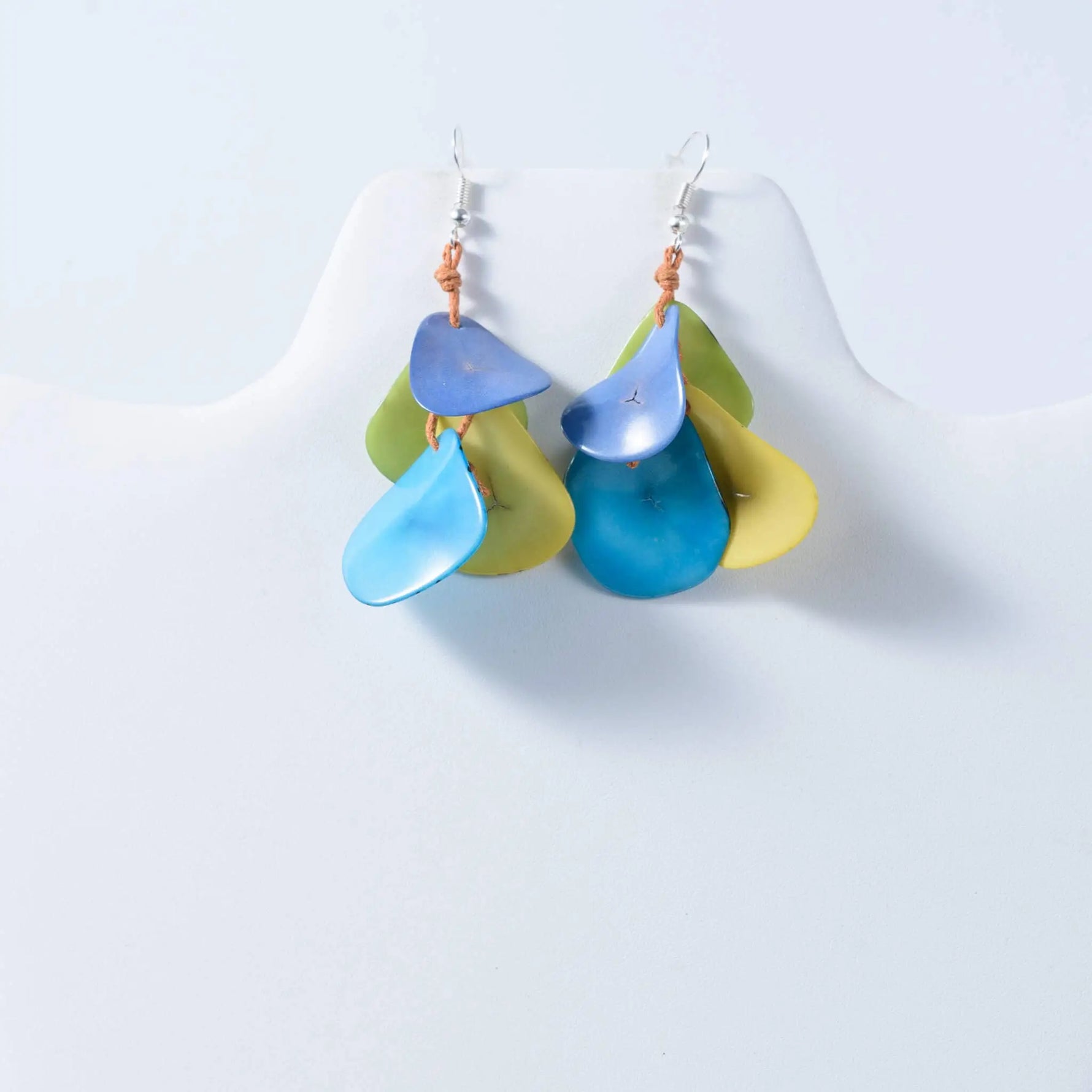 Blue and green layered tagua nut petal drop earrings with silver hooks from holly curved collection