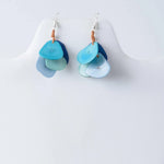 Blue layered shell tagua nut earrings with a natural curved petal design perfect for everyday wear