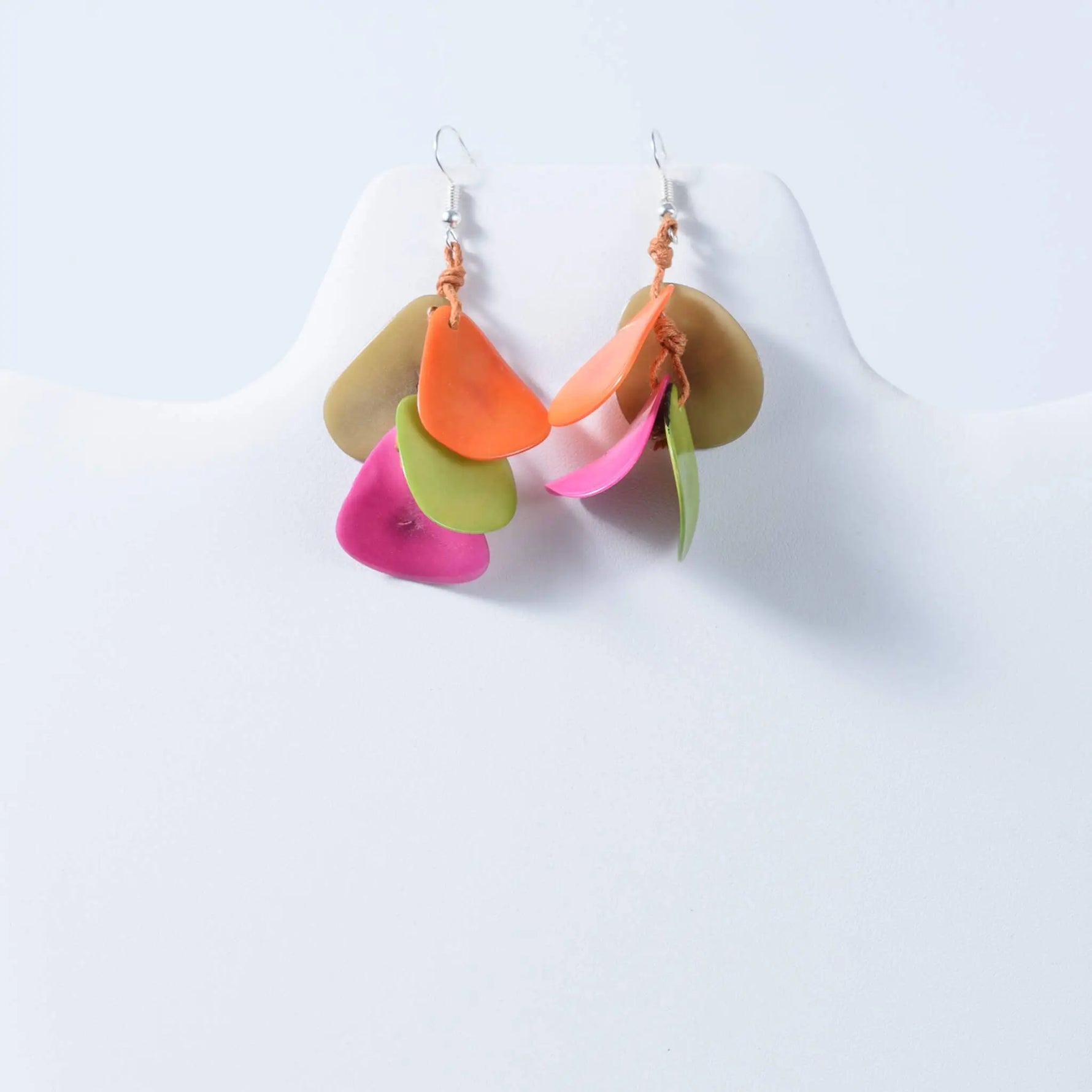 Vibrant holly curved layered tagua nut earrings in orange pink green and beige leaf shapes for stylish looks
