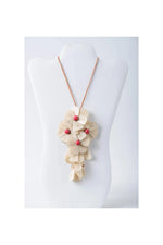 Beige holly pendant flower tagua necklace with delicate layered petals and small red beads in fuchsia style
