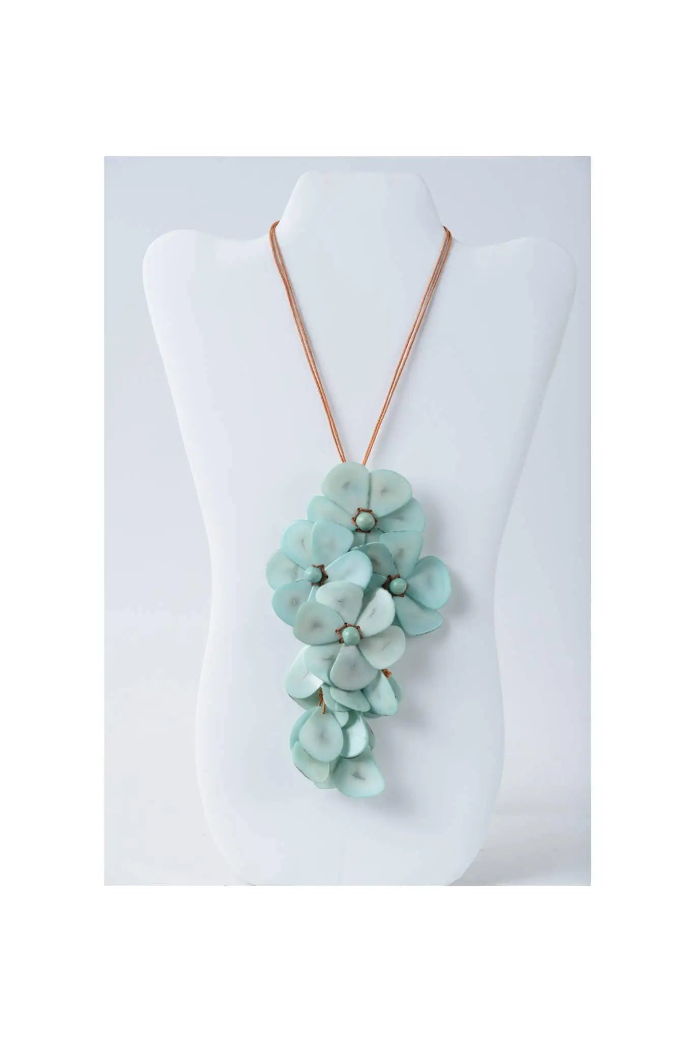 Holly pendant flower tagua necklace with delicate mint green floral layers and a thin copper-toned chain