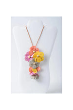 Holly pendant flower tagua necklace with vibrant pink yellow orange and gray fabric blossoms and pearl centers