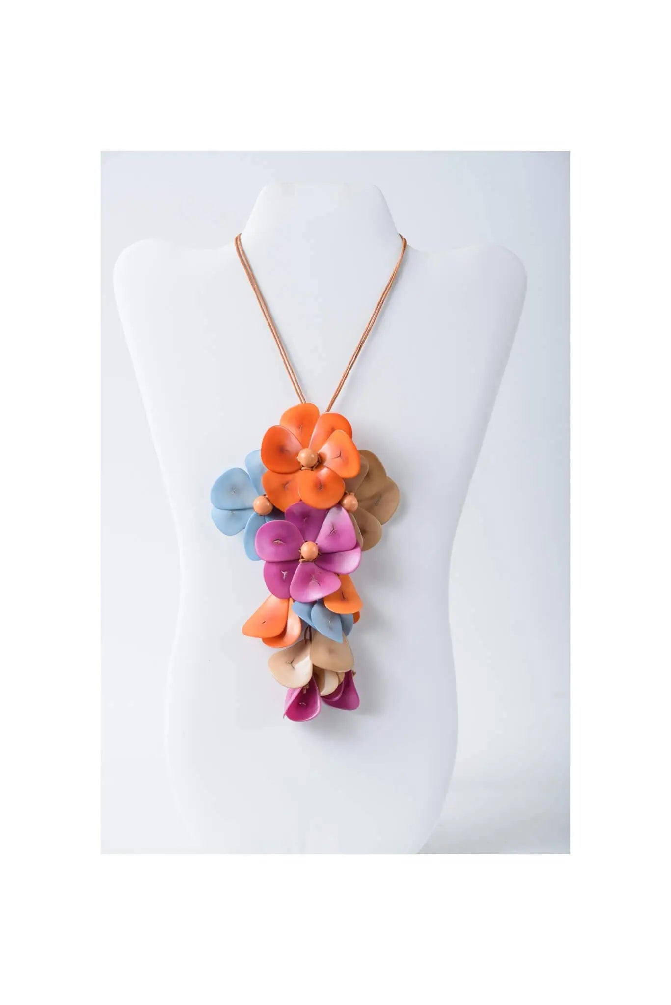 Holly pendant flower tagua necklace with vibrant layered petals in orange blue purple and beige tones