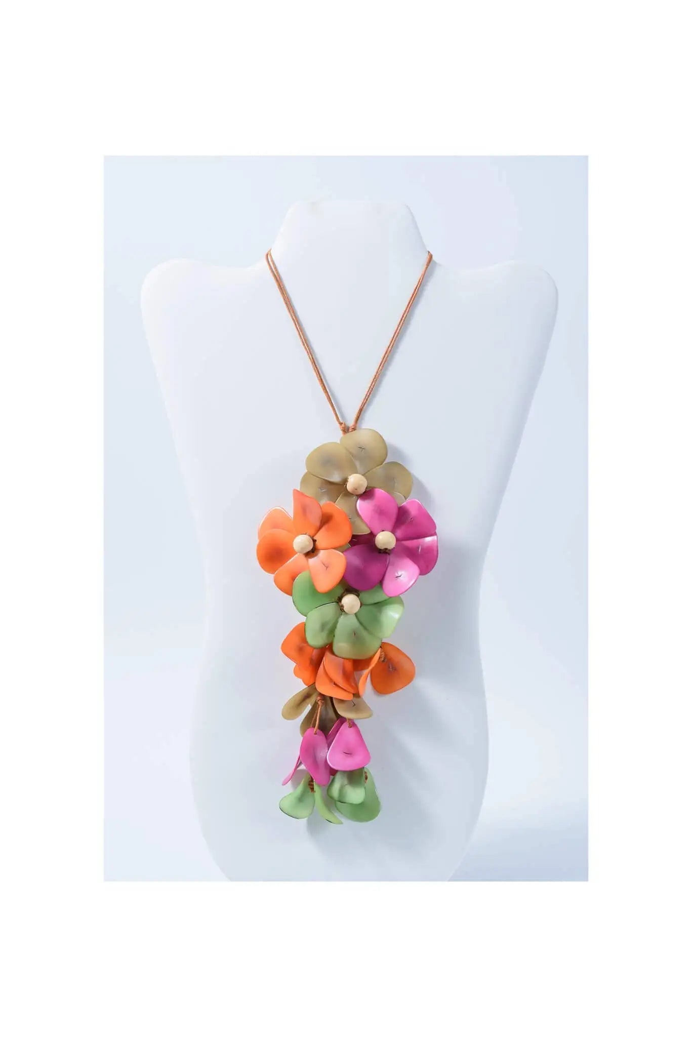 Vibrant multi-colored floral holly pendant necklace with layered orange pink and green tagua blossoms