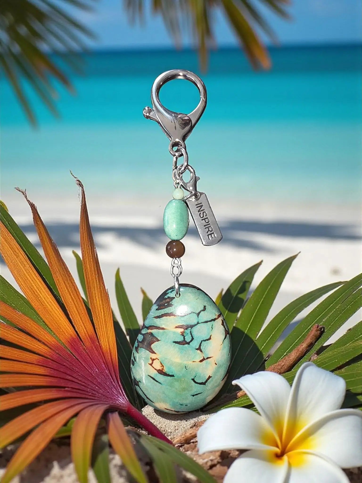 Inspire marble aqua tagua rainforest bag charm with turquoise black stone pendant green brown beads and silver clasp