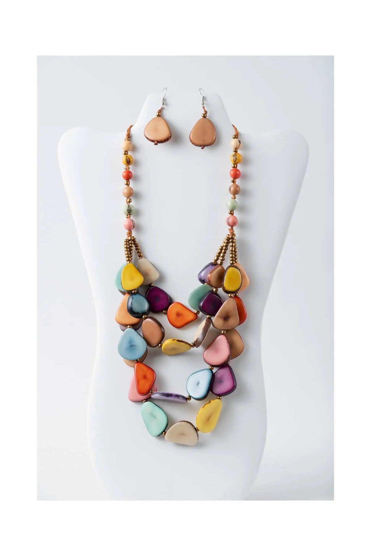 Jess multistranded organic tagua necklace and earrings with vibrant actual colors of yellow orange purple blue and pink beads
