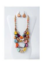 Jess multistranded organic tagua necklace and earrings with vibrant actual colors of yellow orange purple blue and pink beads