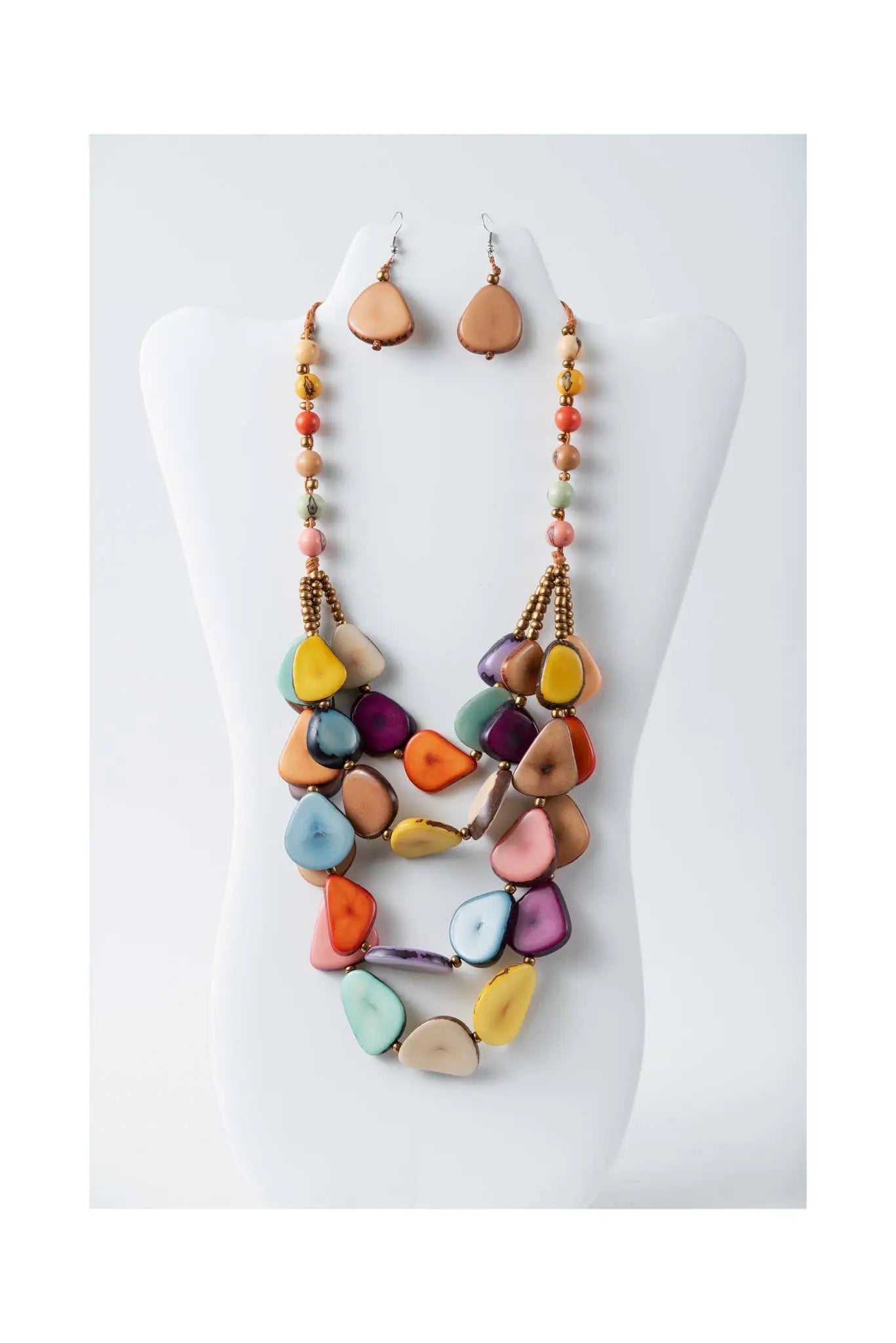 Jess multistranded organic tagua necklace and earrings with vibrant actual colors of yellow orange purple blue and pink beads