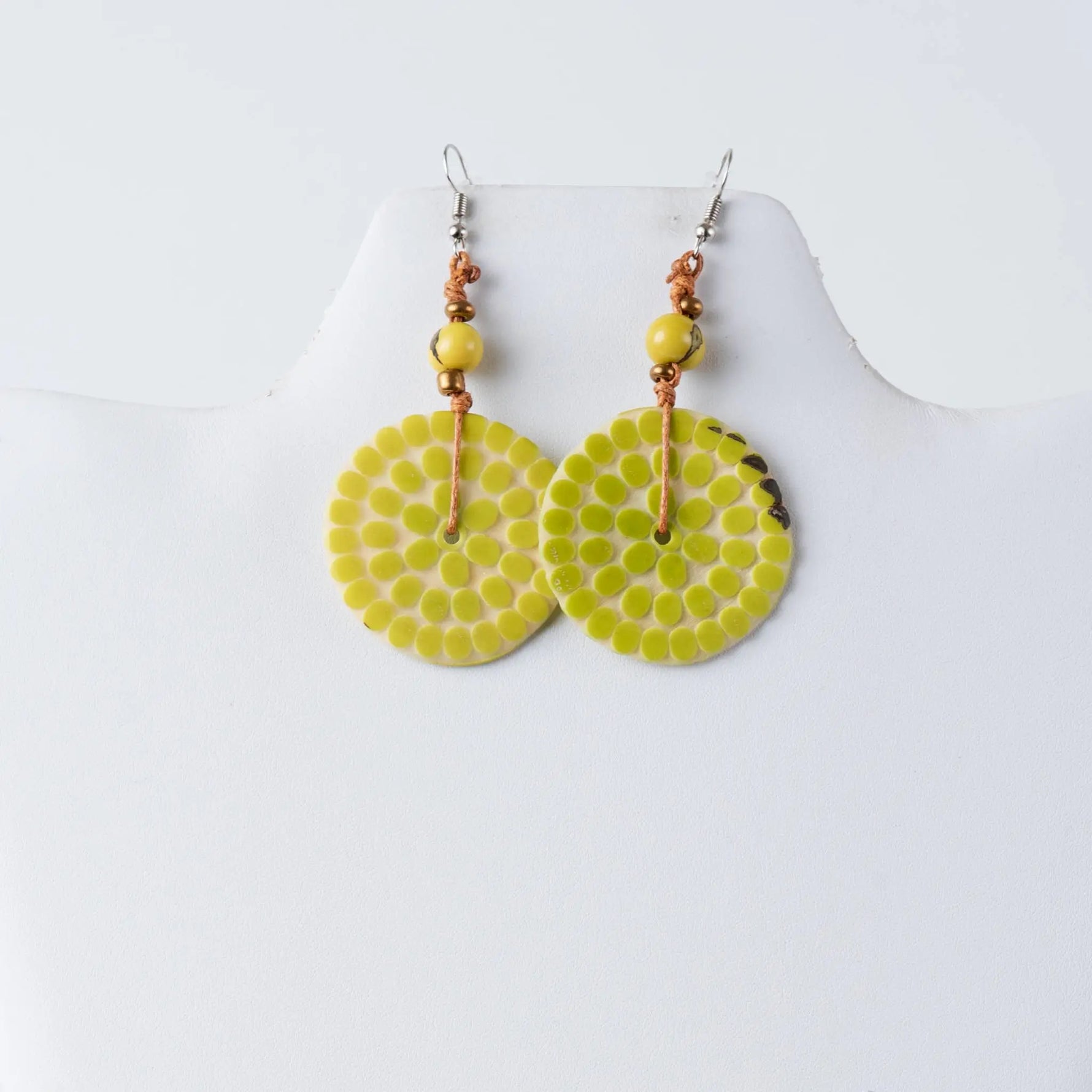 Lime green circular engraved tagua earrings with mosaic dots yellow beads and copper wire from lana eco-chic