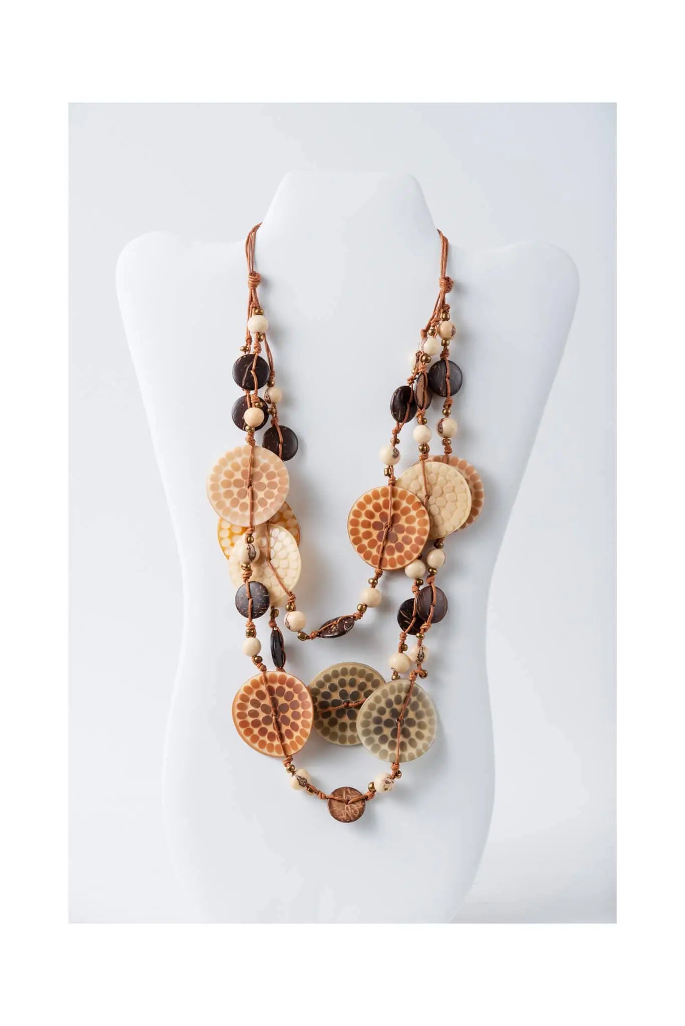 Layered necklace with engraved tagua circular beads tan and brown on natural cord with white pearls eco-chic style