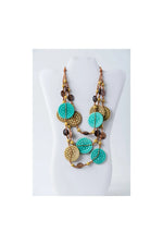 Lana eco-chic layered necklace with engraved tagua beads turquoise and gold-toned circular beads and brown accents
