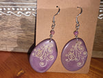 Lavender engraved swirls purple oval earrings with white swirling patterns silver hooks and small pink beads