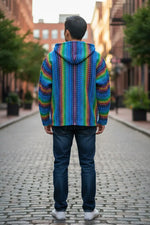 Light gray cream andean sheep wool hand-knitted hoodie with vibrant rainbow stripes and cozy woven patterns