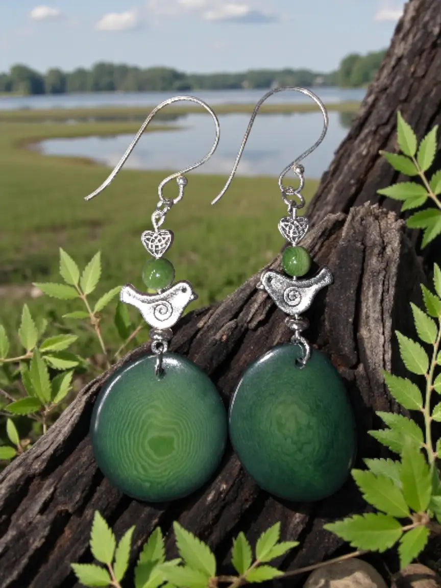 Silver bird and green stone dangle earrings with forest green tagua and pretty swirl bird heart charm