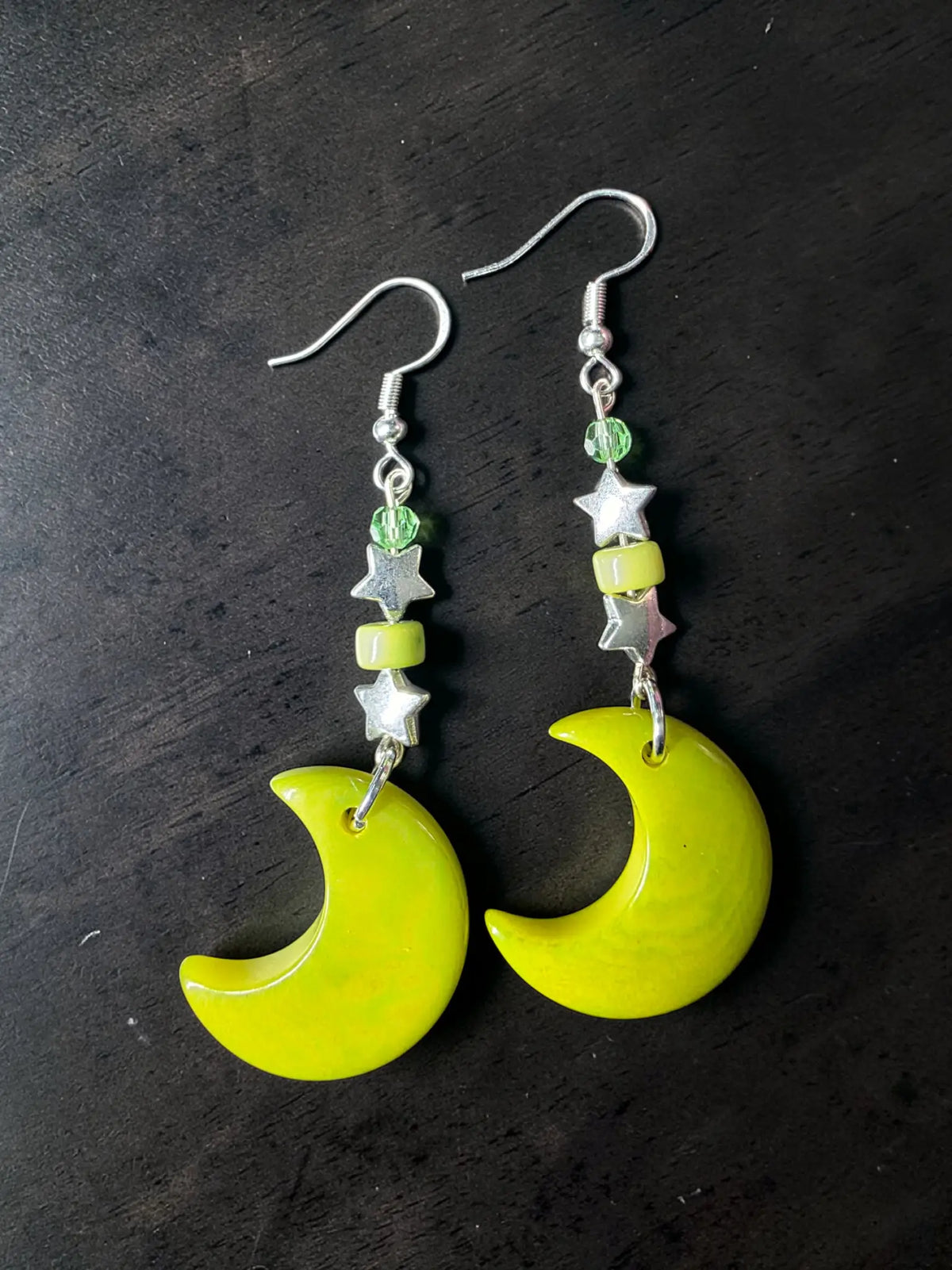 Lime green moon carved tagua nut earrings in yellow with silver star beads and green accents from the rainforest