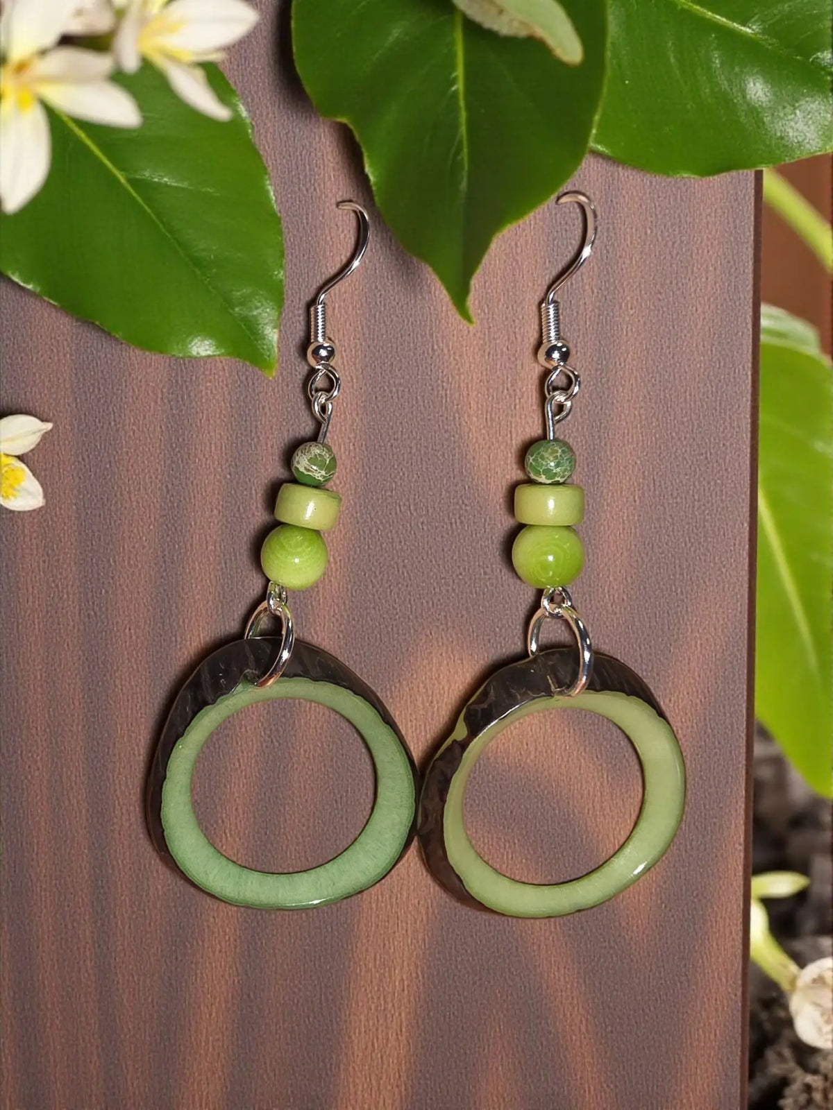 Lime Sherbert natural edge tagua hoop earrings with green matte hoops and three graduated green beads on silver hooks