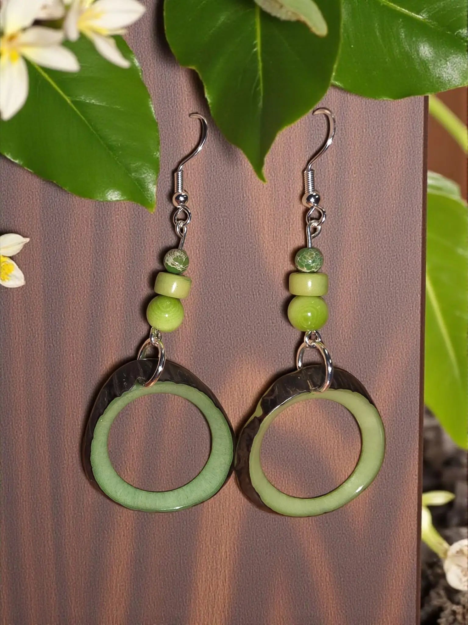 Lime Sherbert natural edge tagua hoop earrings with green matte hoops and three graduated green beads on silver hooks