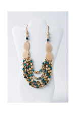 Beige and teal layered beaded liss multi-strand organic tagua statement necklace with oval and square beads
